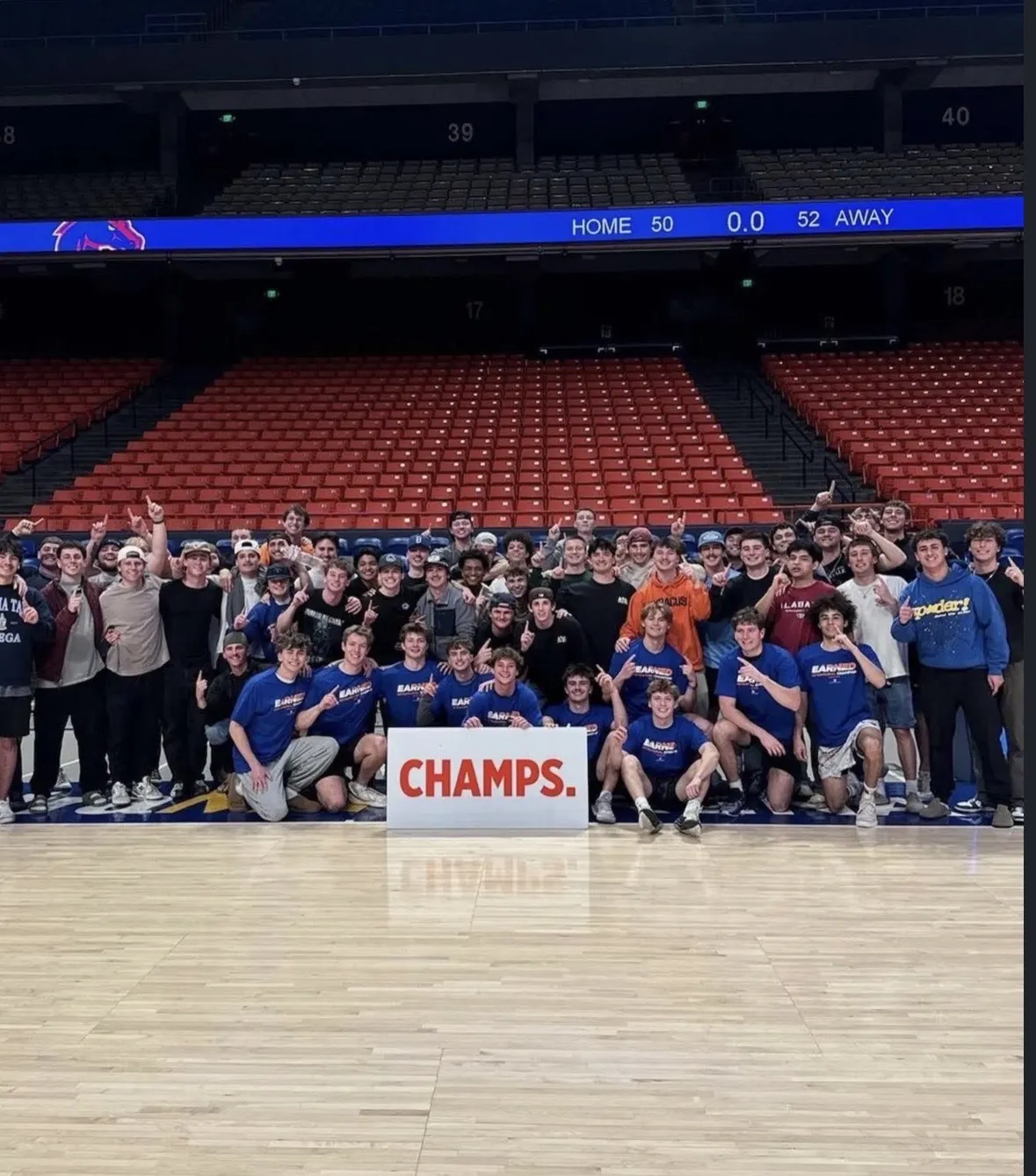 Alpha Tau Omega celebrating an intramural title on the court at ExtraMile Arena